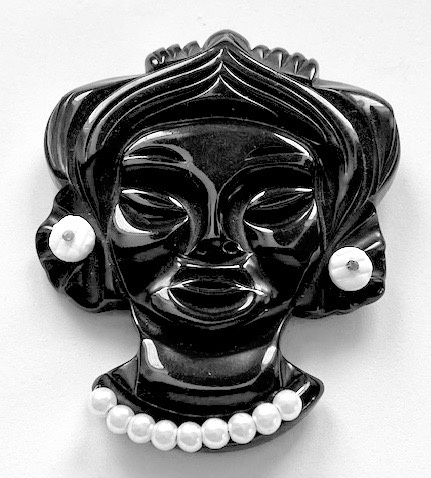 BP86 black Bakelite Balinese woman face pin